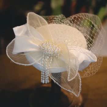 Jaunā Sen stilu, skaistu bowknot fāzēm pušķis neto cepuri līgavas kāzu parauga ceļojumu foto un grims modelēšana